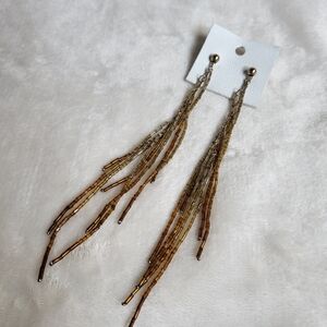 Free People beaded shoulder duster drop earrings.